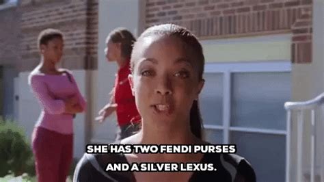 She has two Fendi purses and a silver Lexus.